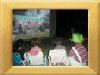 Lucky kids with an Oompah enjoying the movie with them